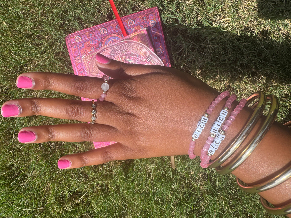 Pink cat’s eye stretch rings