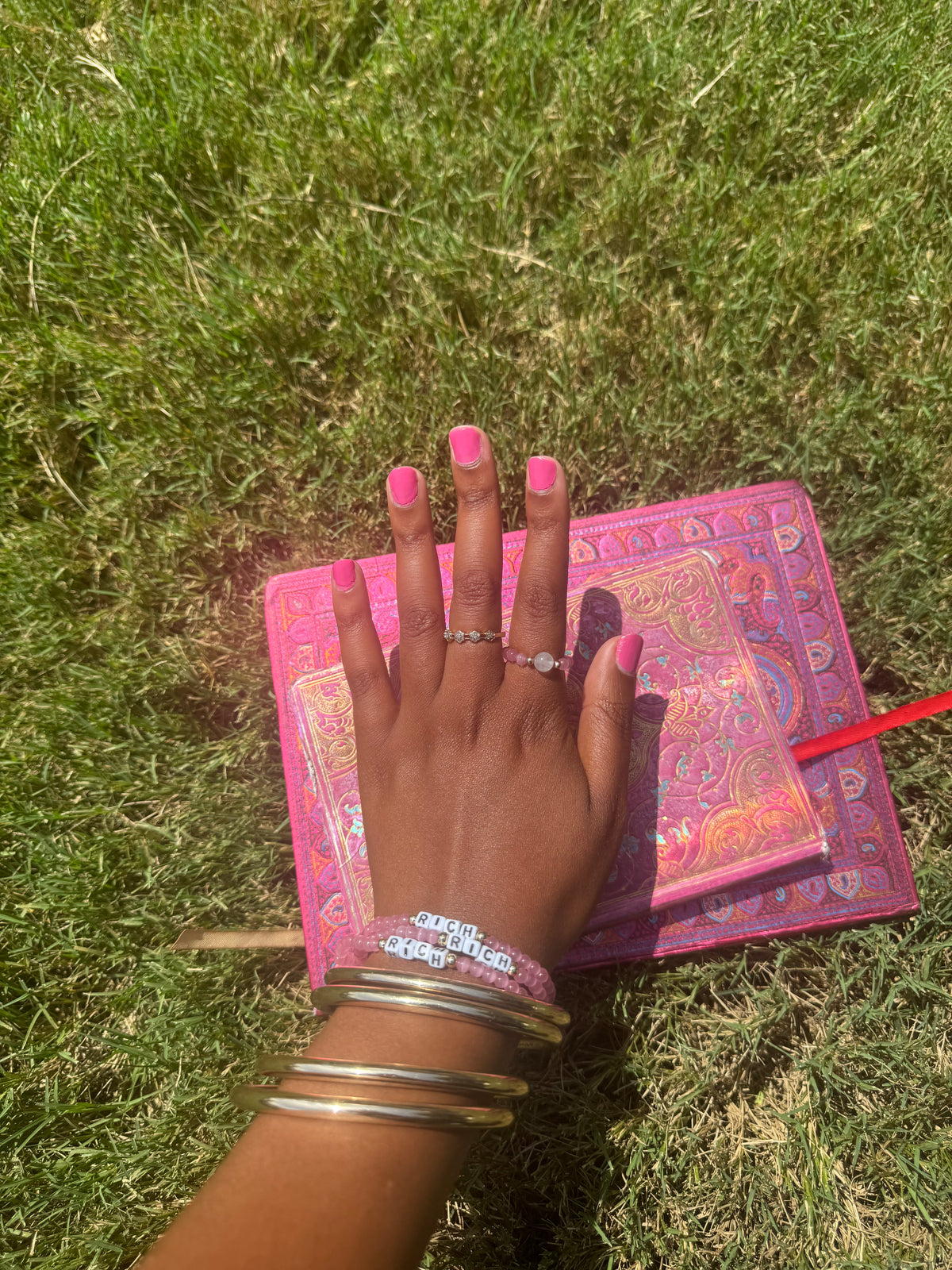 Pink cat’s eye stretch rings